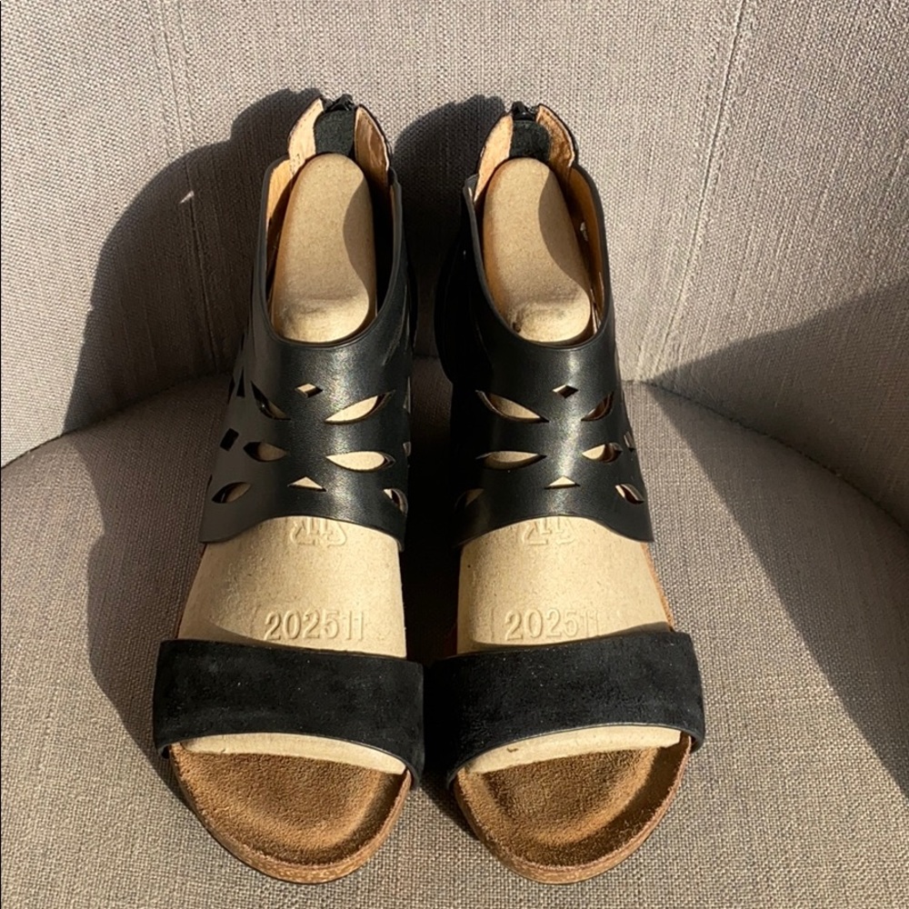 Soft women’s black wedges